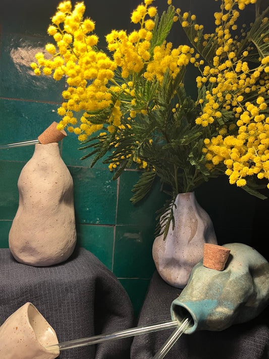 Bouteille sable, Cora