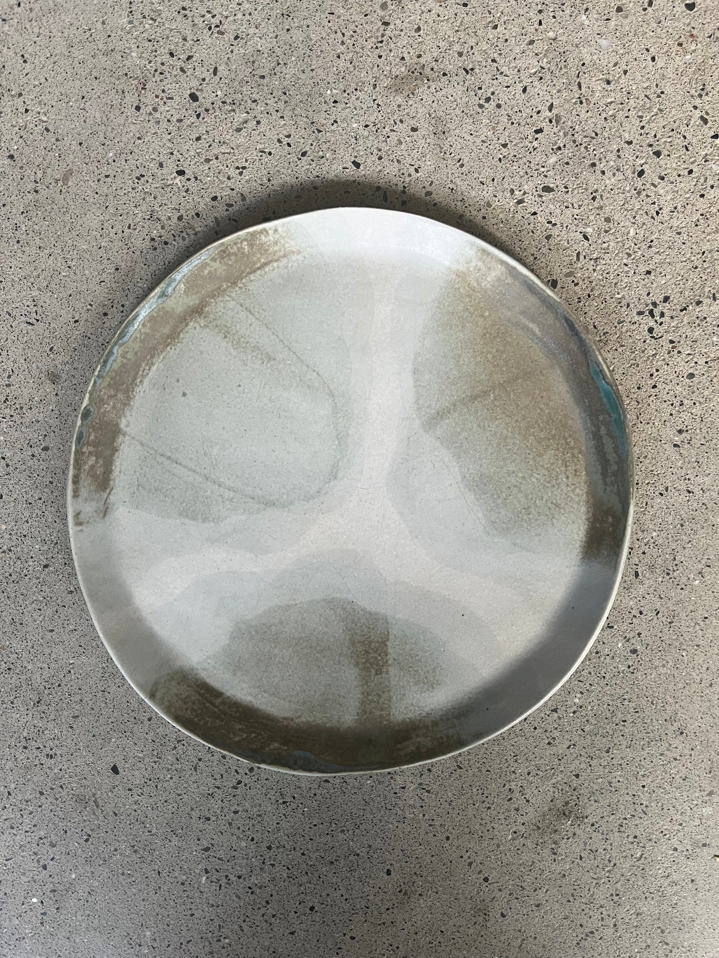 Lot de 6 assiettes et un plat, Anne Kurzberg